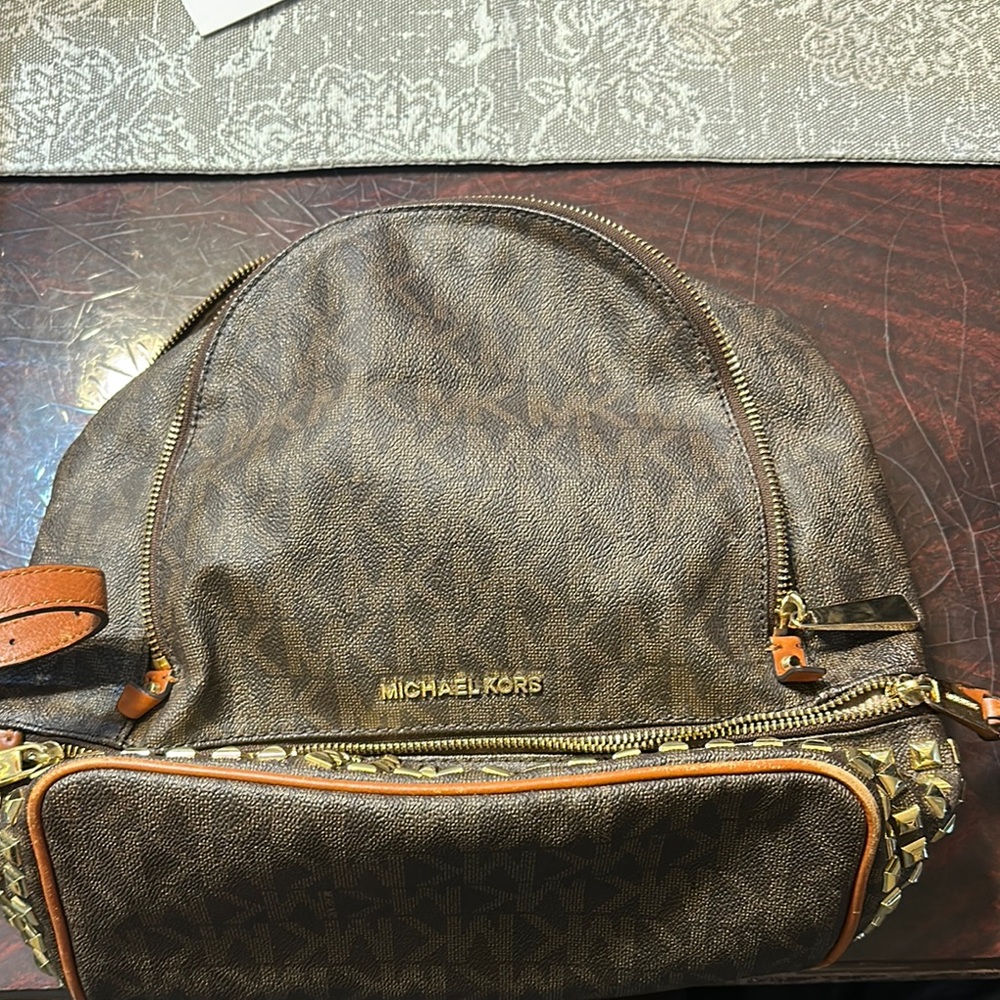Michael Kors Brown Backpack with Gold Zipper and Curved Handle